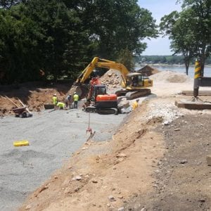 installing precast foundation for seaside home in Guilford, CT