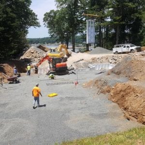 installing precast foundation for seaside home in Guilford, CT