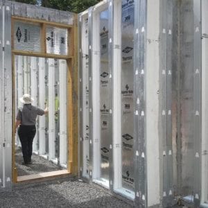 installing precast foundation for seaside home in Guilford, CT