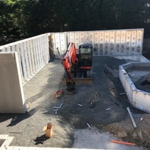 installing precast foundation for seaside home in Guilford, CT