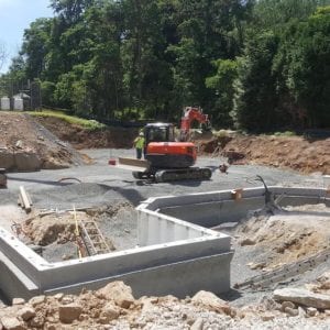 installing precast foundation for seaside home in Guilford, CT